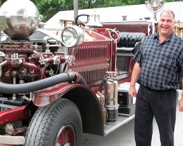 2010 Antique Fire Truck Show 100_0772 Victor Cipriano, next mayor of Johnston, posing with my 1925 Ahrens Fox.