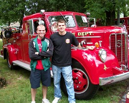 2010 Antique Fire Truck Show 100_0785 Daniel Lamendola and Evan Charello (owner) with 1948 Maxim "S" model.