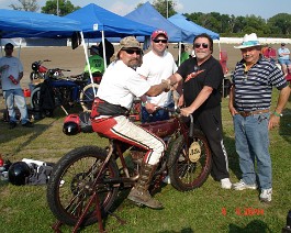 Davenport Iowa Sept 2009 DSC06152 Vince Martenico (on bike), Sean Brayton, Dick Shappy, and Ray Belsito pose with Vince's 1920s Indian Twin. Vince won the qualifying heat but broke down in the...