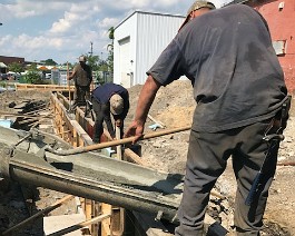 New Showroom Provicence 2017 IMG_5602 Cement pour begins on the upright wall.