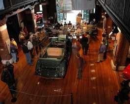 Larz Anderson Museum 2009 DSC_2966 Dick describes various aspects about the restoration of his 1930 Cadillac V-16 All Weather Phaeton (foreground).