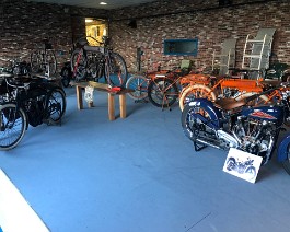 New Showroom 2022 2022-02-05 5868 Bikes in the collection being arranged in place.