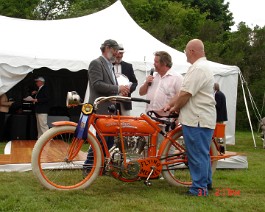 DSC05793 Dick Shappy (on microphone) with his 1914 Flying Merkel Twin accepting "Best Motorcycle" award, Concours d'Elegance, Newport, Rhode Island May 31, 2009.