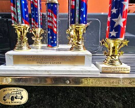 1917 Locomobile Mod 48 Corvette Club of R I 2026 07 The President's Choice Award and Best Paint Award displayed on the running board of the 1917 Locomobile Dual Cowl Sportif at the Rhode Island Corvette Club's...