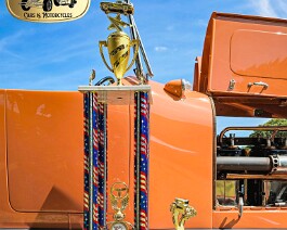1917 Locomobile Mod 48 Corvette Club of R I 2026 10 The President's Choice Award and Best Paint Award displayed on the running board of the 1917 Locomobile Dual Cowl Sportif at the Rhode Island Corvette Club's...