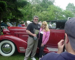 1933 Cadillac V-16 Convertible Coupe body by Fisher dsc00825 Dick and Nancy Shappy posing with the 1933 Cadillac V-16 Convertible Coupe and the "Best Of Show" trophy, July 5, 2005.