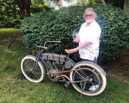 2021ossipeevalley 4323 Dick Shappy and his 1908 Harley Davidson "Strap Tank" at the Antique Motorcycle Show and Swap Meet, Ossipee Valley Fairgrounds in Hiram, Maine on June 27, 2021.