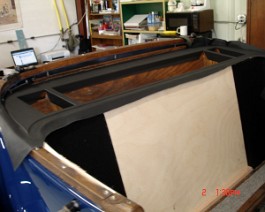 Leather interior work and package tray construction begins.