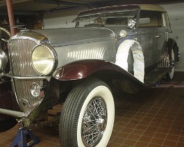 1934 Duesenberg Model J-505 Convertible Sedan Body by Derham DSC00366 Newly chromed wire wheels and tires. (left side)