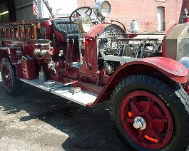 1927 American LaFrance Type 145 Pumper DSC00880 Many fire apparatus extras have been added to this truck since its purchase. Two Dietz Fire King lanterns, four inch soft suction hose, breathing equipment,...
