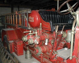 1927 American LaFrance Type 145 Pumper PA280012 Right side showing solid bronze rotary gear pump with 1000 gallon capacity. This pumper is capable of throwing a stream of water 280 feet vertically at the rate...